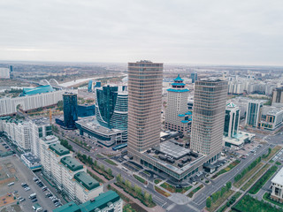 Naklejka na ściany i meble Drone view on buildings in downtown of capital city Astana in Kazakhstan