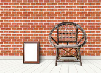 old chair on red brick wall
