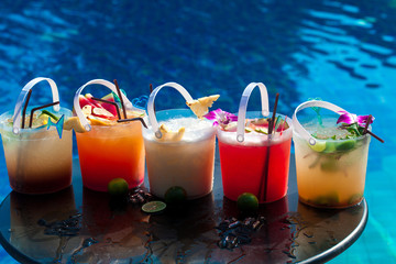 Selection of cocktail in ice bucket special drink for pool party