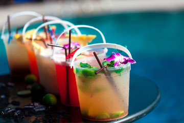 Selection of cocktail in ice bucket special drink for pool party