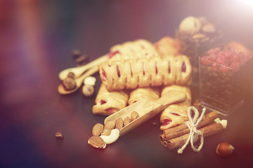 Set for breakfast. Sweets and pastries with nuts for tea on a bl