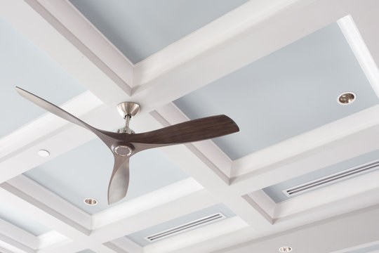 Ceiling Fan in front of the Coffered Ceiling
