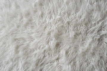close up of a white wool rug