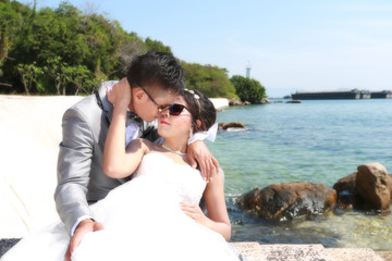 Asian couple photographed before marriage is Pre-wedding on Koh Si Chang Island.