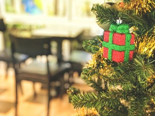 theme vintage of christmas tree, gift box on business office background 