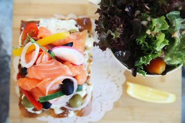 Smoked salmon on toast with salad vegetable