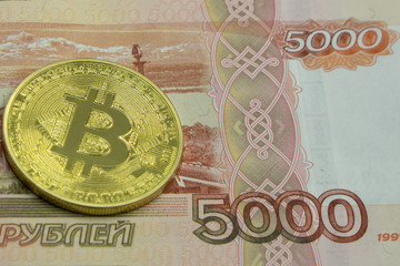 Physical version of Bitcoin, new virtual money. Conceptual image for investors in cryptocurrency, gold and dollars.