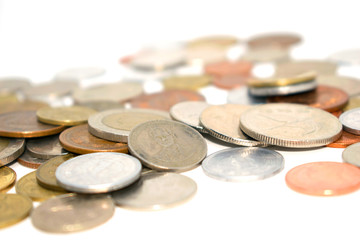 A photo of a large number of coins of different states.