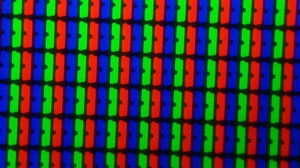 colored pixels from the monitor screen under a microscope