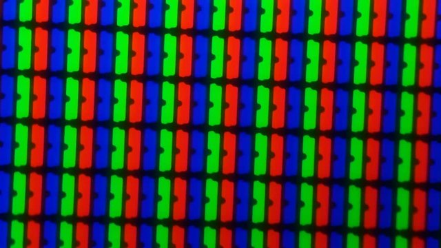colored pixels from the monitor screen under a microscope