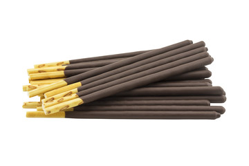 pile of biscuit sticks coated with chocolate isolated on white background