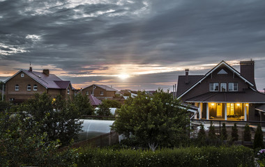 The view from the window of a private house in the village in the evening
