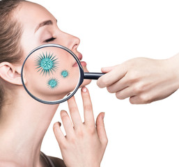 Magnifying glass with microbes on female face.