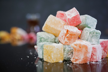 Turkish delights lokum on dark background