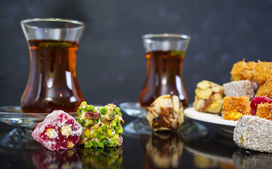 Turkish delights lokum on dark background