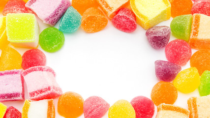 Colorful gummy candy on a white background.