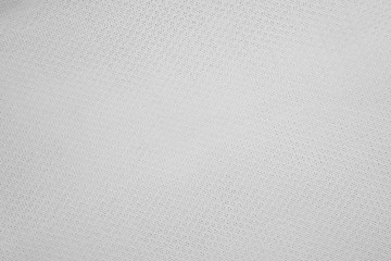 Synthetic fabric texture. Background of white textile