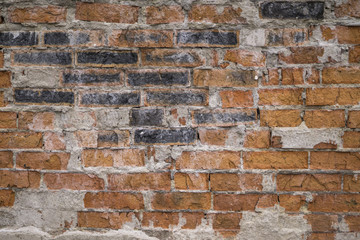Old ruined brick wall texture. Grunge background