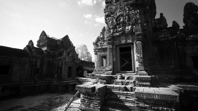 Whip pan across the many ruins of Banteay Srei temple in Angkor Wat Archeological Park.