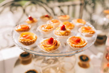 Sweet wedding buffet with different of desserts and fruits.