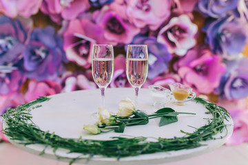 Glasses of alcohol on the wedding table.
