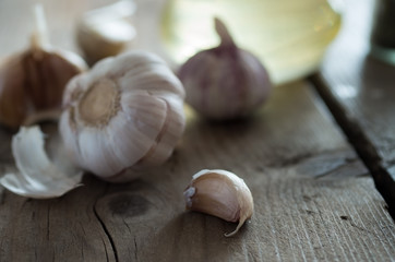 Close up garlic on rustic wood table.