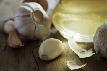 Still life of garlic and oil