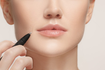 Beautiful young woman before plastic surgery operation.