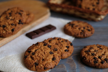 Chocolate cookies on wooden table. Chocolate chip cookies.