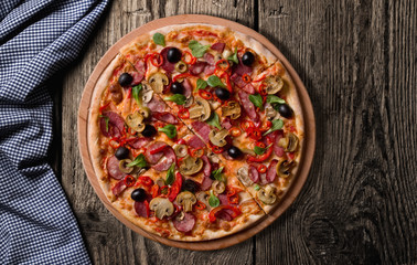 Fresh pizza on wood