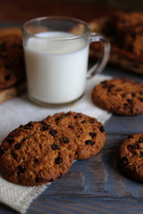 Chocolate cookies on wooden table. Chocolate chip cookies.