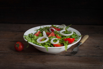cherry tomatoes with arugula salad