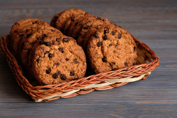 Chocolate cookies on wooden table. Chocolate chip cookies.
