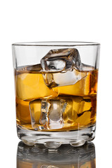 Glass of whiskey with ice and decanter on white background