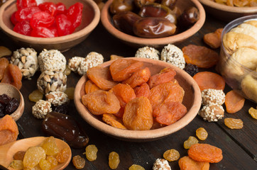 Dried fruits on wooden background