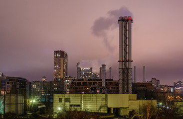 Smoke pipes near apartment buildings
