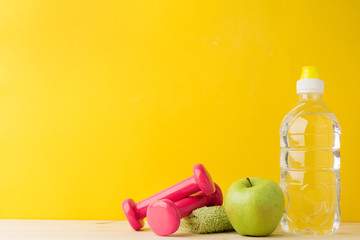 Dumbbells and water bottle