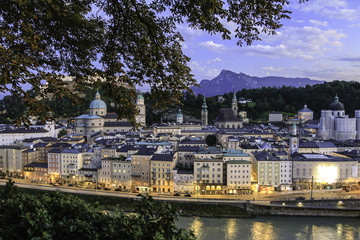 Fototapeta premium Panoramic view over city Salzburg at sunset