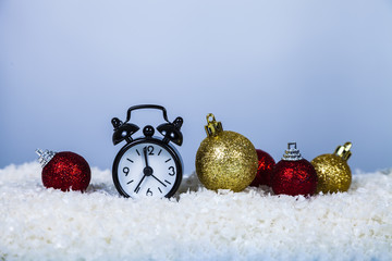 Clock in a Santa hat and balls