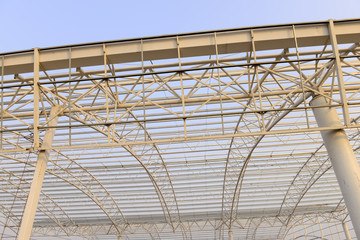 Fototapeta premium Steel structure workshop roof is under construction