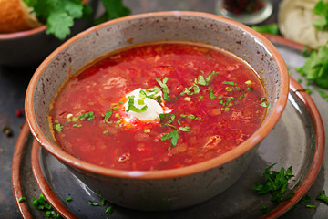 Traditional Ukrainian Russian borscht with beef on the bowl