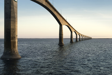 Confederation Bridge over sunset sky, Northumberland Strait, Prince Edward Island, Canada
