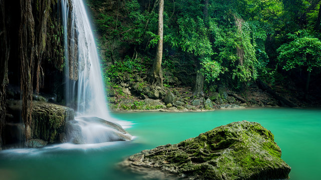 Beautiful green waterfall at deep forest, Erawan waterfall located Kanchanaburi Province, Thailand © peangdao