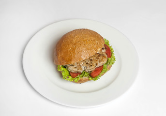 classic burger on a white plate