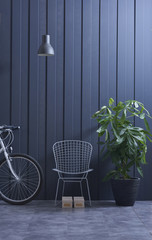 Fototapeta na wymiar dark blue wall background and living room style with bike object