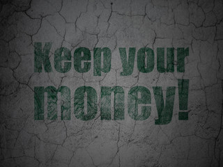 Business concept: Green Keep Your Money! on grunge textured concrete wall background