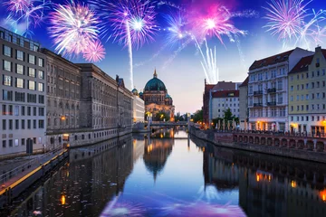 Tuinposter New Years firework display over Spree River in Berlin, Germany © Patryk Kosmider