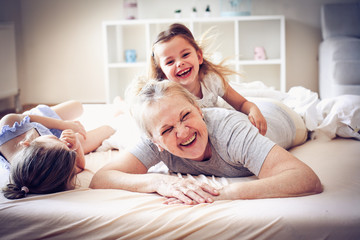 Playing in bed.