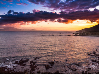 rocky coastline, strait of Gibraltar, Spain, Europe view from a cliff to the sea the mountains in the background are morocco
