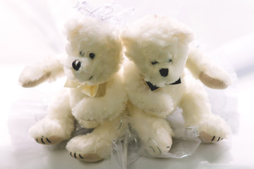 couple of toy plush bears